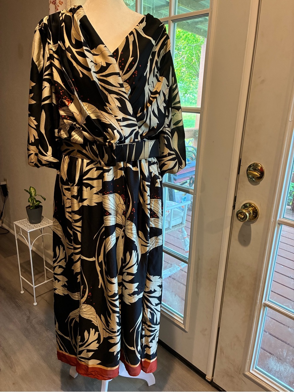 Black Maxi Dress with Cream Botanical Print and Red Hem